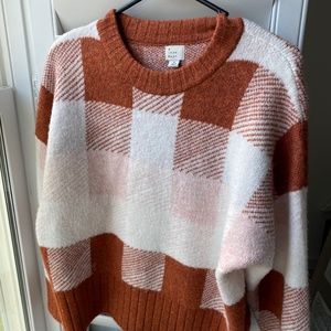 A new day sweater